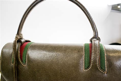 vintage gucci dark brown leather purse|value of vintage Gucci handbags.